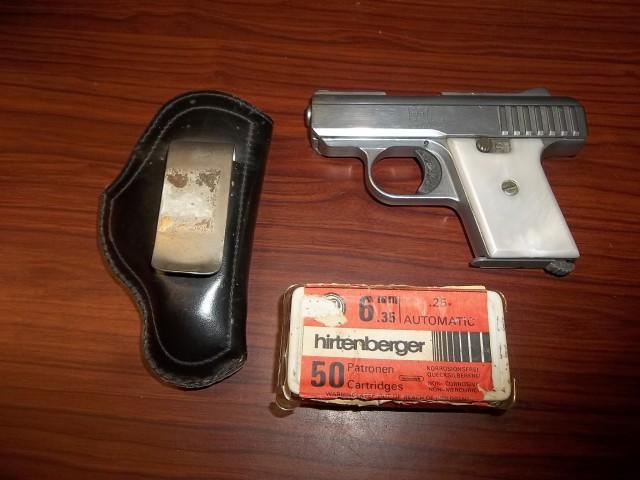 Raven Arms 25 Auto Pearl Grips, Holster, Clip, Ammo